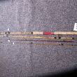 � 2RE- 4d�ln� prut, dva d�ly bambus, jedna �pi�ka dlouh� skeln� lamin�t , druh� pln� lamin�t krat��. DAM blank, oka dr�t�n�, v�vaz �ern�, d�lka 300 cm, 280 cm s lamin. �pi�kou plnou, cena 2600 K�